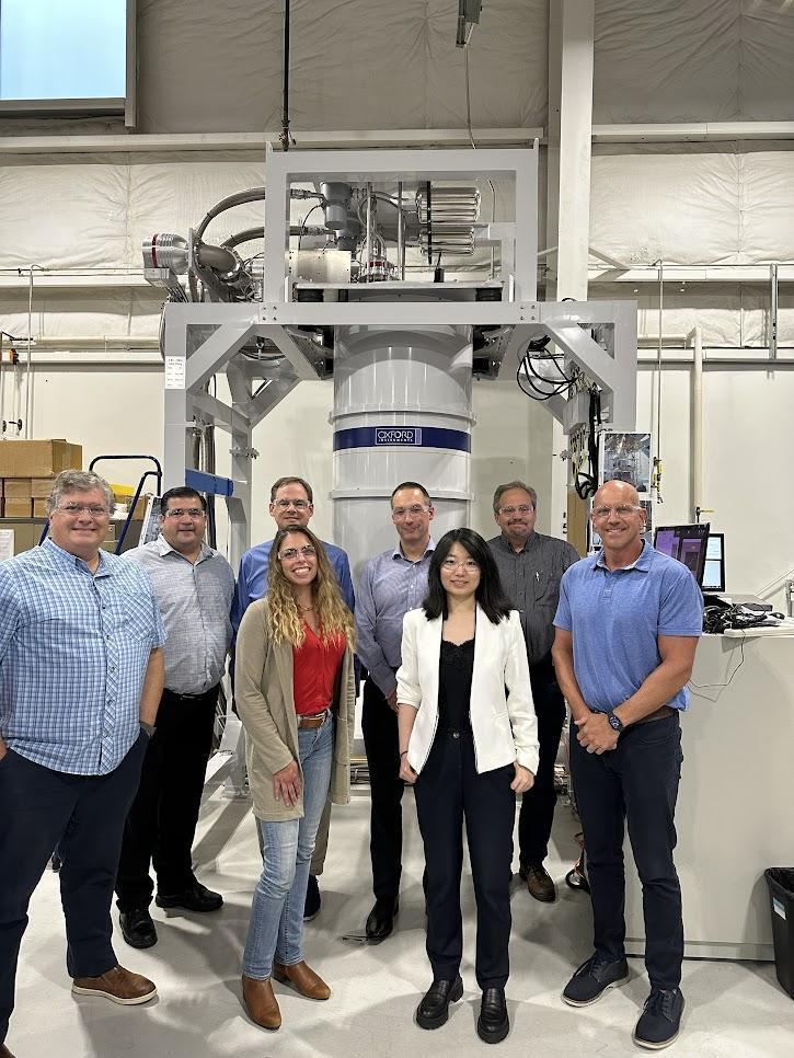 OI NanoScience and Lake Shore team in front of the Triton system in Lake Shore’s factory in Westerville, Ohio